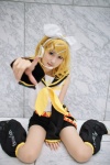 blouse cosplay detached_sleeves hairbow hair_clips headset hiokichi kagamine_rin leggings shorts vocaloid rating:Safe score:0 user:nil!