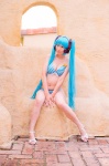 aqua_hair bikini cleavage cosplay hatsune_miku headset mashiro_yuki project_diva swimsuit twintails vocaloid rating:Safe score:0 user:nil!