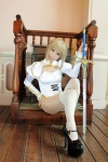 ahoge blonde_hair bodysuit cosplay fate/series fate/stay_night fishnet_stockings kamui_arisa lacrimosa pantyhose saber sword thighhighs rating:Safe score:2 user:nil!