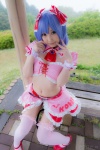 blouse blue_hair bonnet bow cleavage cosplay croptop half_skirt_open_front lenfried remilia_scarlet tail_plug thighhighs touhou wings rating:Safe score:1 user:nil!