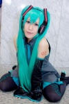 aqua_hair cosplay default_costume hatsune_miku headphones twintails uzuki vocaloid rating:Safe score:1 user:Log