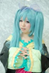 aqua_hair blue_eyes bow cosplay dress hatsune_miku mizusa twintails vocaloid rating:Safe score:0 user:pixymisa