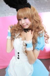 animal_ears blonde_hair bunny_ears choker cosplay dress himemiya_mahore masuwaka_tsubasa_(cosplay) rating:Safe score:0 user:Kryzz