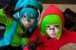 aqua_hair cosplay gloves green_hair gumi harun hatsune_miku headset hoodie jacket matryoshka_(vocaloid) red_eyes shiiya twintails vocaloid rating:Safe score:3 user:pixymisa