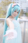 aqua_hair cosplay dress gloves hatsune_miku kana_(iv) tagme_song top_hat twintails vocaloid rating:Safe score:0 user:nil!