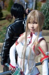 asuna_yuuki blonde_hair chest_armor cosplay detached_sleeves kanda_midori skirt sword sword_art_online rating:Safe score:2 user:NomadSoul
