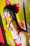 cosplay detached_sleeves hairbow hakurei_reimu mike one-piece_swimsuit swimsuit touhou rating:Safe score:2 user:nil!