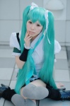aqua_hair blouse cosplay hair_ribbons hatsune_miku hayase_ami like_a_rolling_star_(vocaloid) miniskirt skirt thighhighs tie twintails vocaloid zettai_ryouiki rating:Safe score:0 user:nil!
