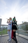 blonde_hair cape cosplay dress elbow_gloves gloves green_hair hairbow kurenai_aiki macross macross_frontier microphone ranka_lee sheryl_nome thighhighs top_hat yu-cco zettai_ryouiki rating:Safe score:0 user:pixymisa