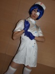 cosplay eyepatch gloves ikkitousen nurse nurse_cap nurse_uniform pantyhose ryomou_shimei sakura_marimo thighhighs rating:Safe score:0 user:nil!