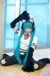 animal_ears aqua_hair blouse cat_ears cosplay hatsune_miku headset miiko project_diva trousers twintails vocaloid rating:Safe score:1 user:nil!