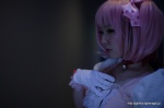 choker cosplay dress gloves hairbows kaname_madoka momo pink_eyes pink_hair puella_magi_madoka_magica twintails rating:Safe score:0 user:pixymisa