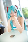 aqua_hair bikini cosplay hatsune_miku headset kishimen project_diva swimsuit twintails vocaloid rating:Safe score:0 user:pixymisa