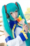 aka aqua_hair cosplay detached_sleeves dress hatsune_miku headset miracle_paint_(vocaloid) paintbrush twintails vocaloid rating:Safe score:0 user:nil!