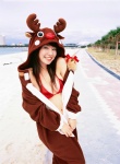 beach bell bikini_top cleavage costume ocean open_clothes reindeer_costume swimsuit tani_momoko vyj_no_71 rating:Safe score:1 user:nil!