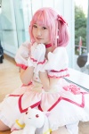 bows choker cosplay dress gloves hairbow kaname_madoka kneehighs kujyou_konegi pink_hair plushie puella_magi_madoka_magica red_eyes tiered_skirt twintails rating:Safe score:0 user:pixymisa