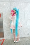 aqua_hair bow cosplay dress hatsune_miku kneesocks lots_of_laugh_(vocaloid) plushie rushi twintails vocaloid rating:Safe score:3 user:pixymisa