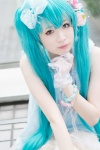 aqua_hair cosplay crinoline flowers gloves hairbow hatsune_miku kii_anzu lingerie necklace twintails vocaloid rating:Safe score:1 user:pixymisa