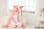 bed cosplay dress hairband megurine_luka pink_hair saku twintails vocaloid world_is_mine_(vocaloid) rating:Safe score:0 user:nil!