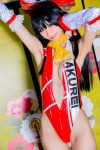 cleavage cosplay detached_sleeves hairbow hakurei_reimu mike one-piece_swimsuit swimsuit touhou rating:Safe score:3 user:nil!