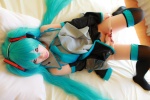 aqua_hair arai_yomi bed blouse cosplay detached_sleeves hatsune_miku headset panties pleated_skirt skirt thighhighs tie twintails vocaloid rating:Questionable score:2 user:nil!
