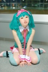 collar cosplay cuffs green_hair hairband kujyou_konegi macross macross_frontier ranka_lee shorts thighhighs tie vest rating:Safe score:0 user:pixymisa