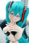 aqua_hair cosplay hatsune_miku pleated_skirt skirt tagme_song tshirt twintails uu vocaloid rating:Safe score:0 user:nil!