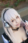 blonde_hair choker cleavage cosplay headphones jacket miyuki_(iii) nitro_super_sonic pink_eyes super_soniko tubetop rating:Safe score:0 user:pixymisa