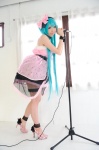 aqua_hair cosplay dress garter hairband hairbow hatsune_miku momoiro_reku tagme_song twintails vocaloid rating:Safe score:5 user:xkaras