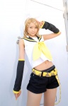 blonde_hair cosplay default_costume detached_sleeves hairbow hair_clips headset hiromichi kagamine_rin pantyhose sailor_uniform school_uniform shorts vocaloid rating:Safe score:0 user:nil!