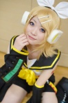 blonde_hair cosplay detached_sleeves hairbow hair_clips headset kagamine_rin leggings nepachi sailor_uniform school_uniform shorts vocaloid rating:Safe score:1 user:nil!