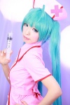 aqua_hair cosplay hatsune_miku nurse nurse_cap nurse_uniform syringe tachibana_sakura twintails vocaloid rating:Safe score:1 user:pixymisa