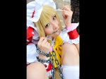 blonde_hair blouse chain cosplay flandre_scarlet hanausagi_manyu kneehighs touhou vest rating:Safe score:0 user:LittleSweetLoli