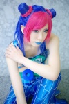 cosplay jojo_no_kimyou_na_bouken kuujou_jolyne mizusa multi-colored_hair tank_top trousers twin_buns rating:Safe score:0 user:nil!