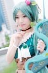 asagi_asuka bow_(weapon) cherry cincher_belt cosplay dress earth_nana green_eyes green_hair magical_suite_prism_nana seriha side_ponytail rating:Safe score:0 user:pixymisa