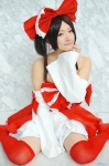 cosplay detached_sleeves dress hairbow hakurei_reimu kishigami_hana miko thighhighs touhou zettai_ryouiki rating:Safe score:2 user:nil!