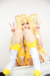 amatsuka_miyu blonde_hair boots choker cosplay cure_peace dress hairband kise_yayoi pikapikapikarin ponytail pretty_cure shorts smile_precure! torn_clothes rating:Questionable score:1 user:nil!