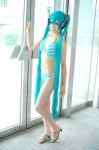 aqua_hair bikini cosplay hair_ribbons hatsune_miku headset swimsuit twintails utateika-na vocaloid rating:Safe score:3 user:pixymisa