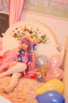 amatsuka_miyu bed cosplay dress hat lollipop patchouli_knowledge purple_hair robe stuffed_animal thighhighs touhou zettai_ryouiki rating:Safe score:1 user:nil!