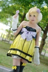 ahoge blonde_hair colorful_x_melody_(vocaloid) cosplay detached_sleeves dress ear_muffs kagamine_rin microphone pepeko project_diva thighhighs vocaloid zettai_ryouiki rating:Safe score:1 user:nil!
