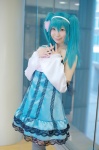 aqua_hair colorful_x_melody_(vocaloid) cosplay detached_sleeves dress hairband hatsune_miku kei project_diva thighhighs twintails vocaloid zettai_ryouiki rating:Safe score:0 user:nil!