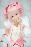 bows choker cosplay dress gloves hairbows kaname_madoka kurasaka_kururu pink_hair puella_magi_madoka_magica tiered_skirt rating:Safe score:0 user:pixymisa