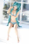 aqua_hair bikini cleavage cosplay hatsune_miku neko swimsuit tagme_song twintails vocaloid rating:Safe score:9 user:nil!