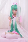 aqua_hair cosplay hatsune_miku hiiragi_haruka nurse nurse_cap nurse_uniform stethoscope thighhighs twintails vocaloid zettai_ryouiki rating:Safe score:0 user:pixymisa