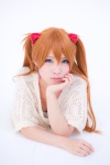 blue_eyes cosplay hair_pods neon_genesis_evangelion red_hair soryu_asuka_langley sweater twintails uri rating:Safe score:1 user:pixymisa