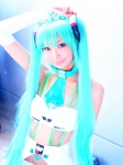 aqua_hair bikini cosplay detached_sleeves hatsune_miku necoco skirt swimsuit twintails vocaloid rating:Safe score:0 user:nil!