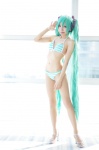 aqua_hair bikini cosplay hatsune_miku headset hisame_chirumi pantyhose project_diva striped swimsuit twintails vocaloid rating:Safe score:6 user:nil!