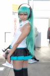 aqua_hair cosplay glasses hatsune_miku headphones necoco pantyhose pleated_skirt skirt sleeveless_blouse thighhighs tie twintails vocaloid zettai_ryouiki rating:Safe score:2 user:pixymisa