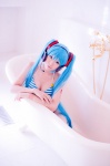 aqua_hair bathroom bathtub bikini cleavage cosplay hatsune_miku headset mashiro_yuki project_diva swimsuit twintails vocaloid rating:Safe score:0 user:nil!