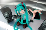 aqua_hair cosplay default_costume detached_sleeves hatsune_miku headset mizuno_shiro pleated_skirt skirt thighhighs tie twintails vocaloid rating:Safe score:2 user:nil!